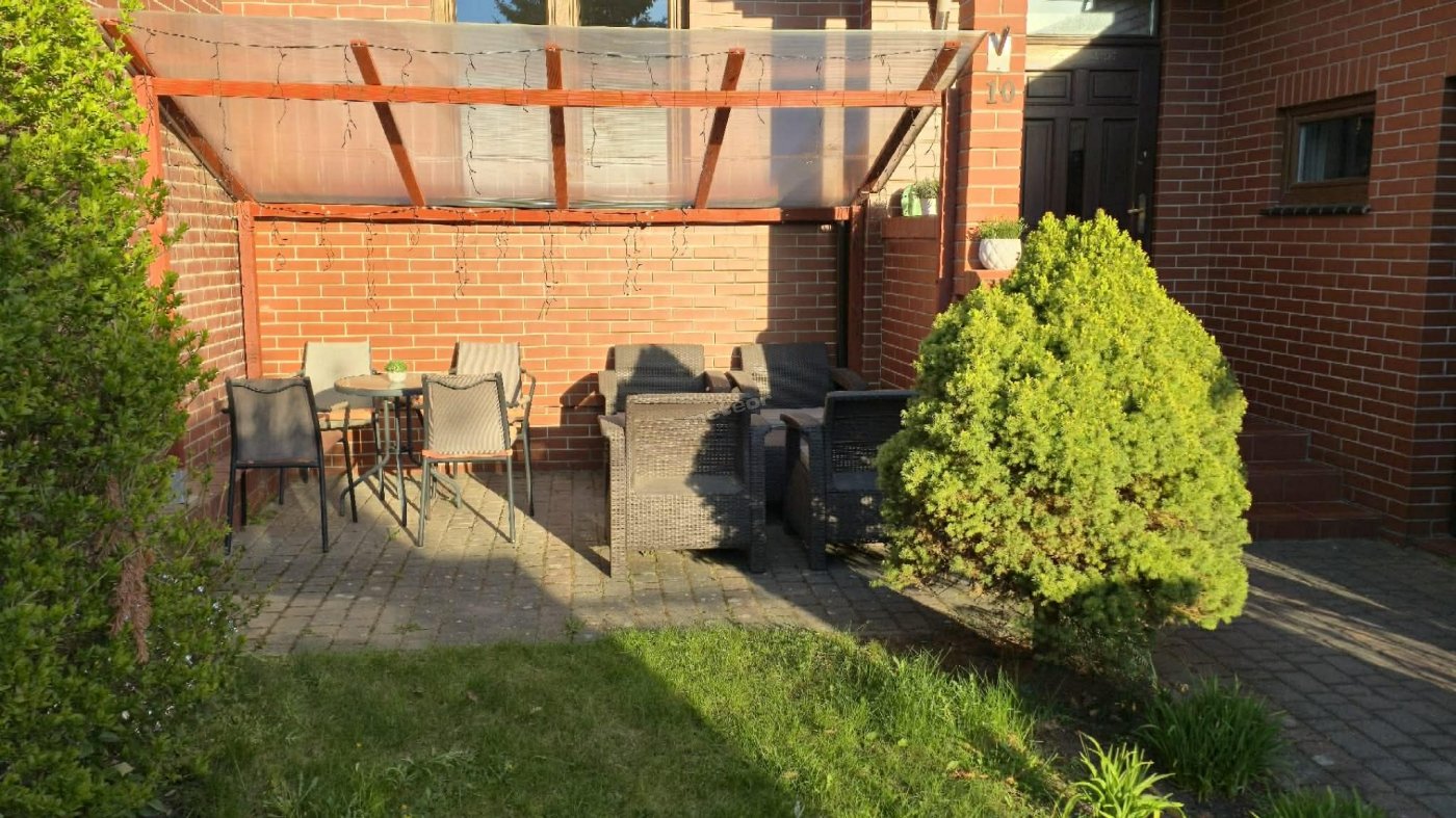 Ogródek z grillem I zestawem wypoczynkowym. 