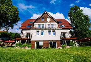 Mazurskie Apartamenty "Jak Tu Miło"